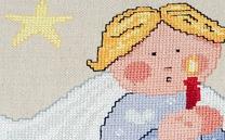 Angelo cross-stitched pillow 