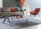 Poltrona di design in tessuto bouclé con struttura in acciaio Hanna – BertO