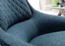 Il cuscino dello schienale della poltrona da design moderno Hanna è dotato di cuciture decorative - BertO Outlet